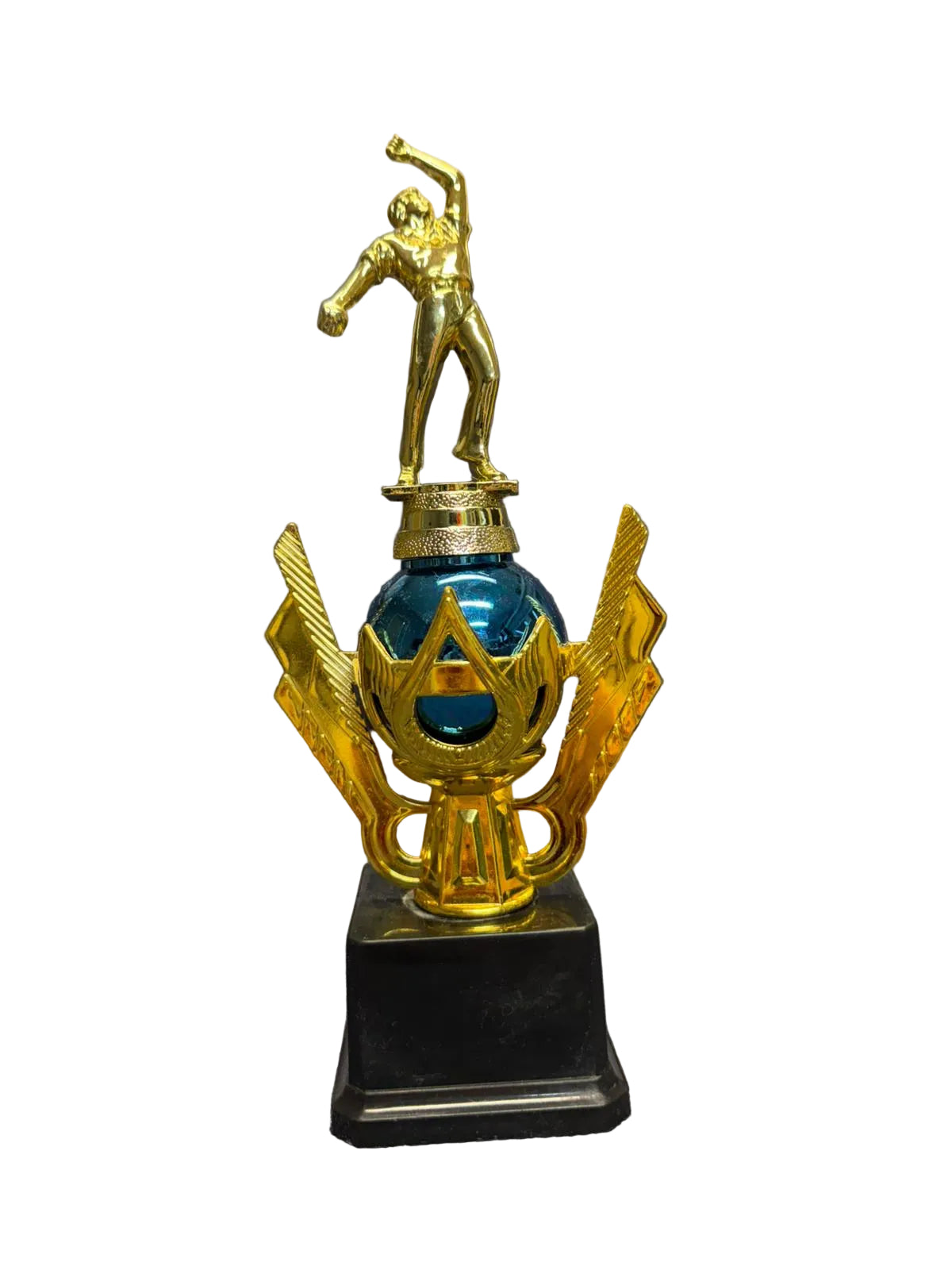 Decorative trophy with gold figure and blue sphere on a gray chair